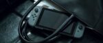 Consola Nintendo Switch con un par de Joy-Cons inalámbricos V3 en rojo y azul neón - Imagen 6